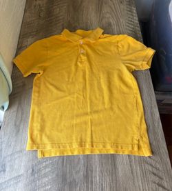 The children’s place boys yellow polo shirt size 7-8