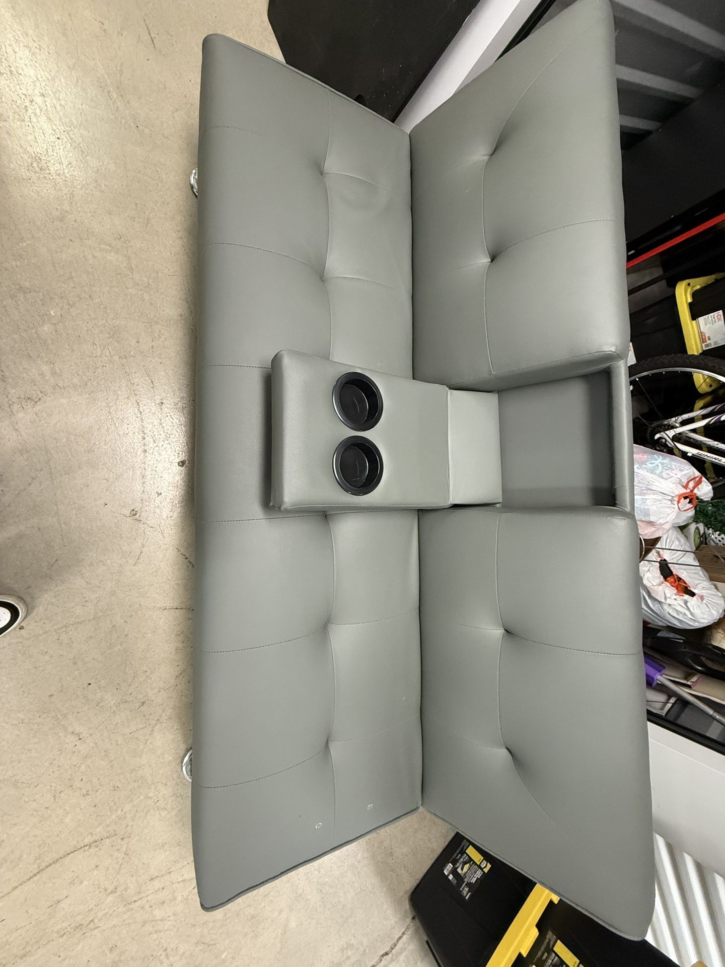 Grey Futon with cup holders