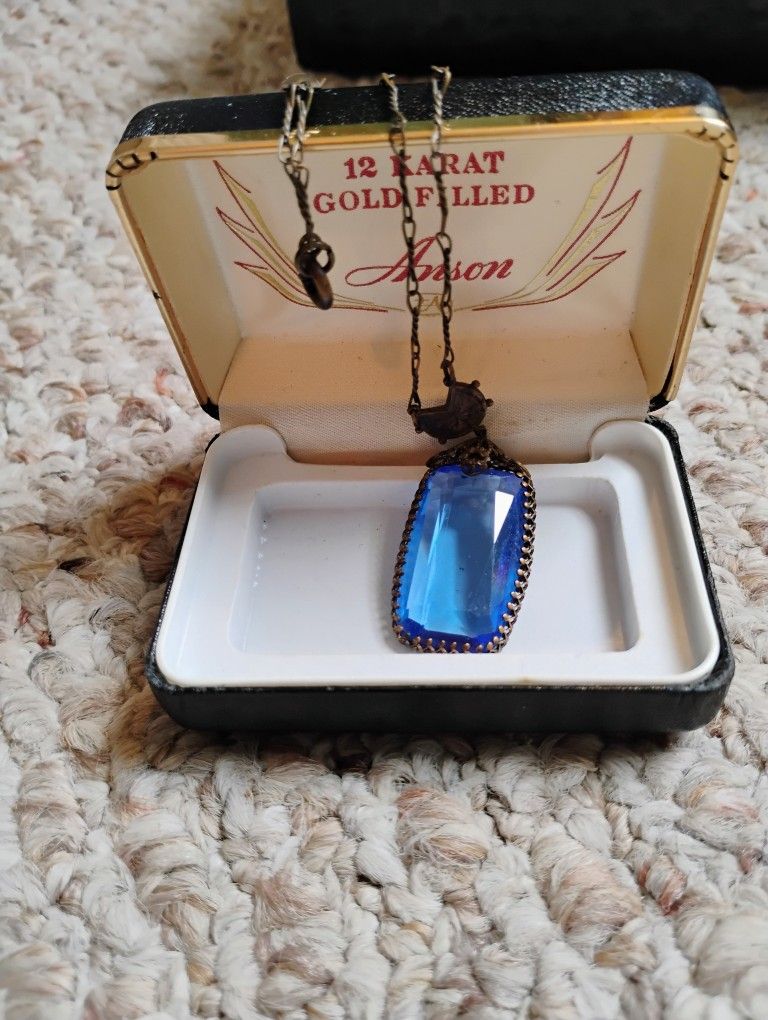 Elegant “Mid-century Anson,” “Gold-filled vintage necklace,” “Faceted blue stone,” “Original box included.”  