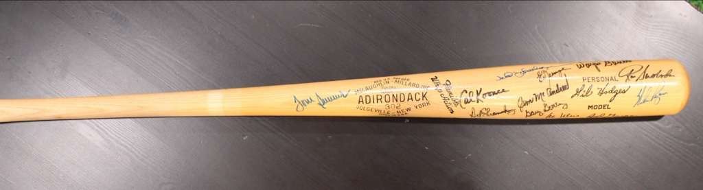 1969 New York Mets Autographed bat with over 20 signatures including Nolan Ryan and Tom Seaver. Certified with official Letter of Authenticity