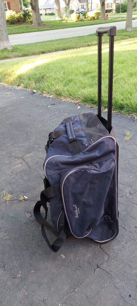 Cloths Duffle Bag with Wheels & Handle - Eddie Baure