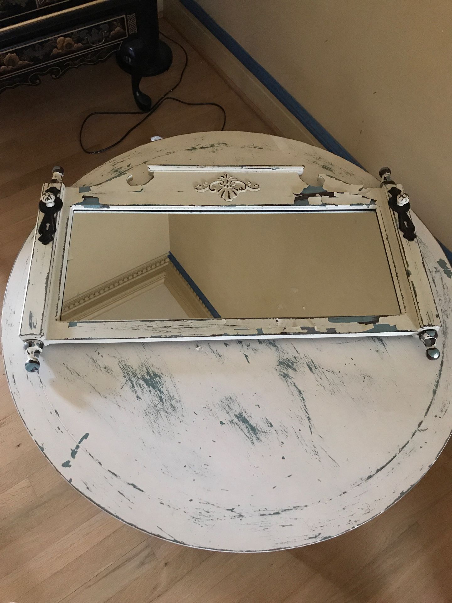 Matching mirror and round all wood coffee table