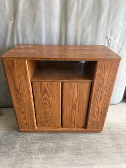 Wooden tv stand with lots of storage