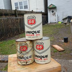 Phillips 66, unique motor oil 1 qt. Cardboard can metal lid. Vintage
