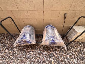 Metal wood rack; 2 - 40 lb. Bundles of wood