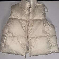 cream puffy vest