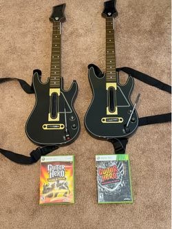 Guitar Hero bundle w/ guitars, world tour, and warriors of rock