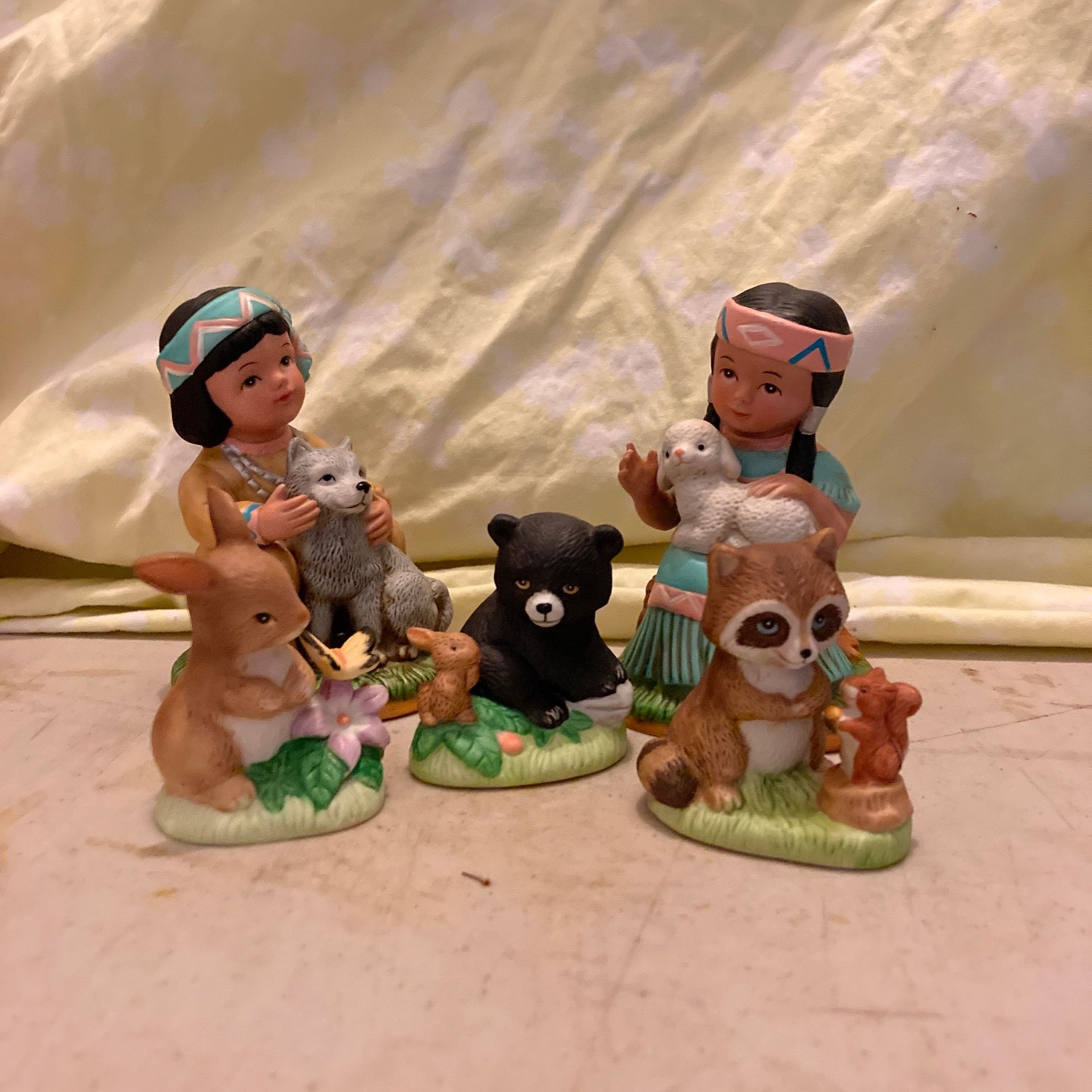 Ceramic figurines native American children