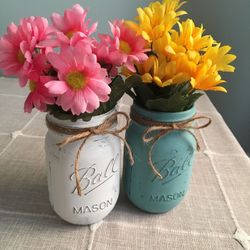 Mason jars with silk flowers