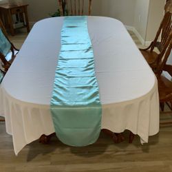 White Tablecloths & Turquoise Satin table runners