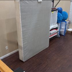 Queen-size box spring with fabric cover non Slip in good condition. Clean and ready to use.   Dimensions: 79” L × 60” W × 9” H