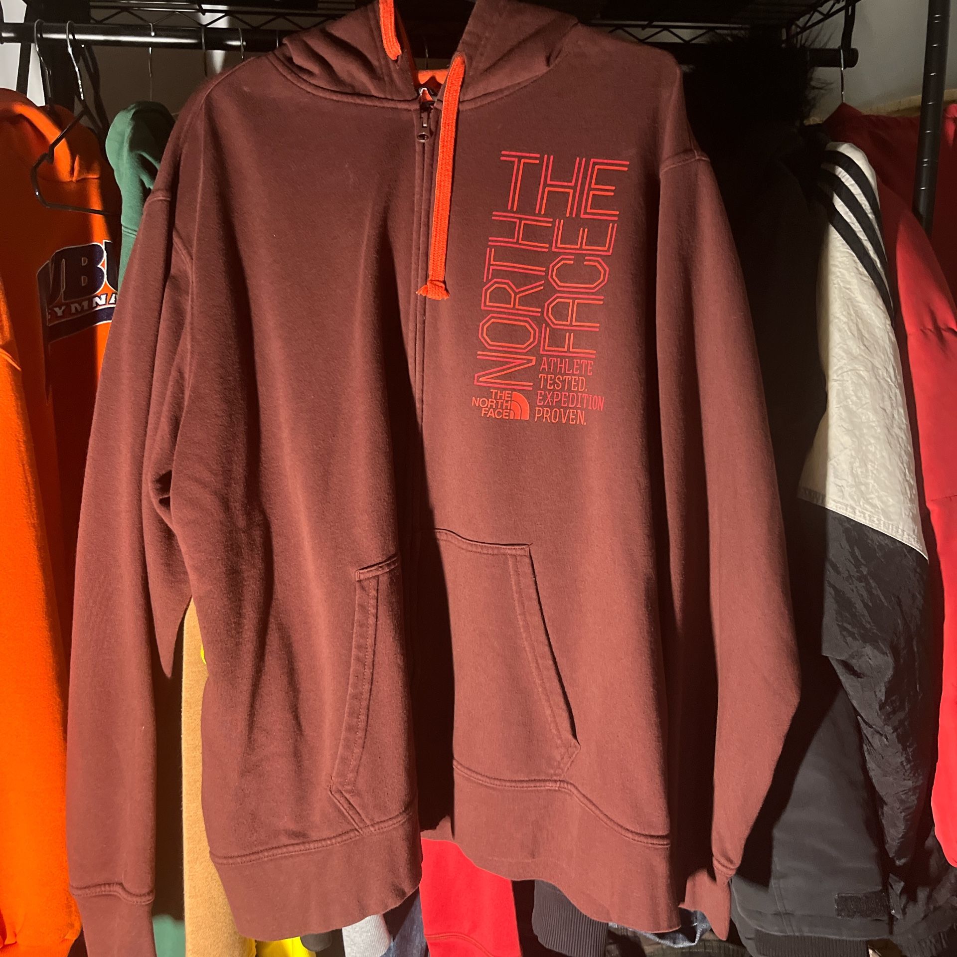 BROWN AND ORANGE “THE NORTH FACE” ZIP UP