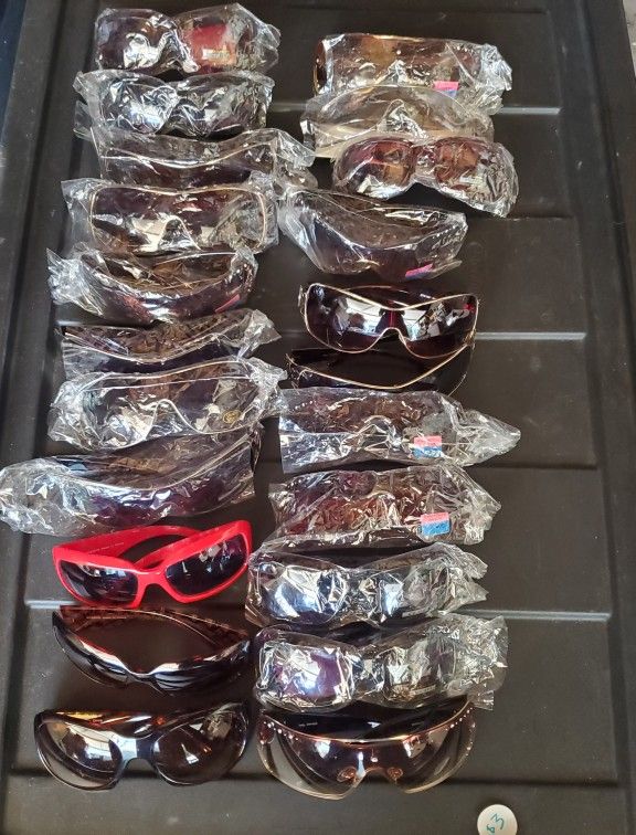 LOT OF SUNGLASSES. Moving Out