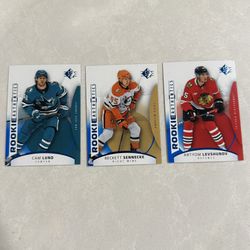 Beckett Sennecke, Cam Lund, Artyom Levshunov 2025-2026 Upper Deck SP Rookie Authentics