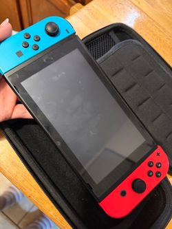 Nintendo Switch with Neon Joy-Cons and 5 Games