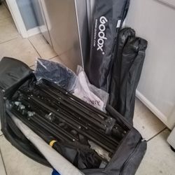 Studio Equipment. Light Stands, Phone Stands, Umbrellas, And More.