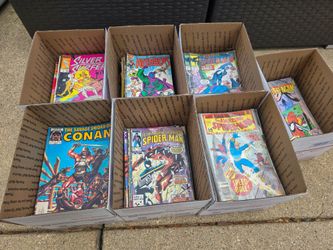 7 boxes of mainly marvel comic books