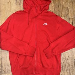 Red Nike hoodie size M in men.