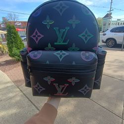 Preloved Cosmos XL Black Louis Vuitton backpack With Free Louis Vuitton Epi Leather Dufflebag