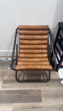 Brown leather comfy chair