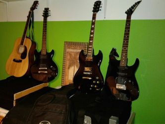 Electric & Acoustic Guitars.