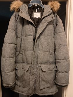 Men's Signature Grey Puffer Jacket With Removable Fur.