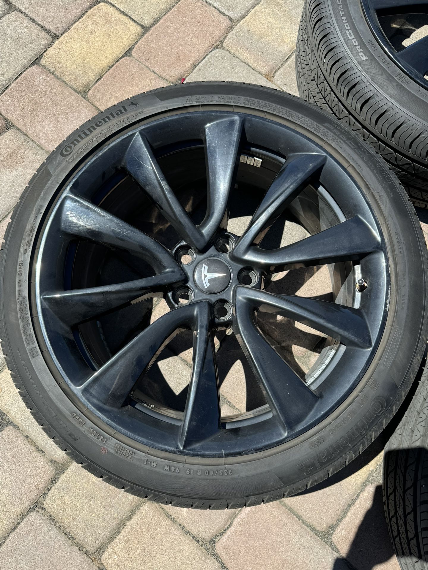 OEM Tesla Model 3 Sport Wheels in Black with tires 