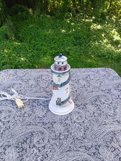 Vintage 1995 ceramic lighthouse accent lamp. Needs a bulb