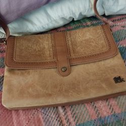 Lady's Pocketbook The Sak 100% Leather On The Outside 40 Dollars 