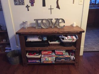 Table, two benches and a side shelf unit.