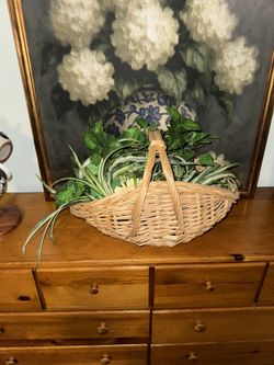 Weaven basket with fake greenery