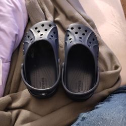 A Pair Of Navy Blue Crocs