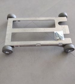 SAW BLADE ROLLER