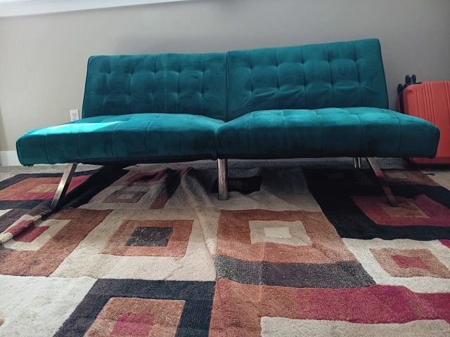 Green velvet futon