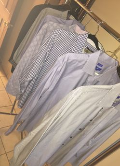 6 men’s dress shirts and one sports coat