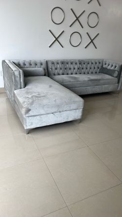 Gray Velvet Sectional Sofa with a storage.
