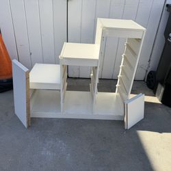 Step Up Unit In Good Condition  39” Wide  37” High  17” Side  With 6 Shelves 