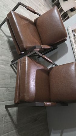 2 Ashley leather chairs