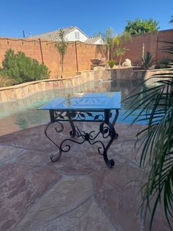 Wrought iron table with glass top 26x26 , 21” tall