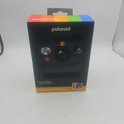 Polaroid Now Instant Camera, likely a Generation 2 or 3 model, known for its classic design and instant film capabilities. 