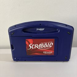 Scrabble deluxe edition board game turnable board with drawers to store the letters & trays