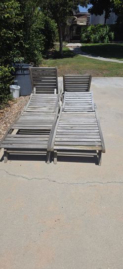 4 Teak lounge chairs