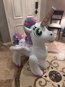 Unicorn blowup with water fountain