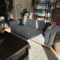 Pebble Gray Article Timer Couch And Ottoman