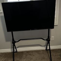 43 inch 4k Lg TV With Next Level Racing Stand