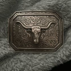 A Silver Longhorn Belt Buckle  