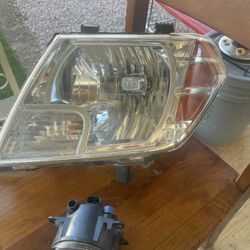 2012 Frontier OEM Used Left Headlight 