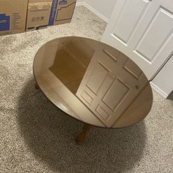 Coffee table with glass cover