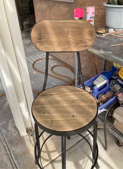 Nice wooden and rod iron bar stool