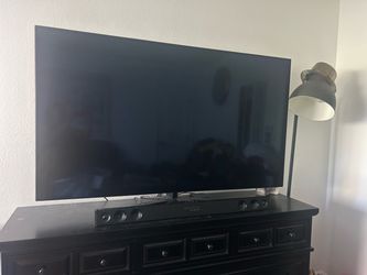 65 inch smart TV with sound bar included
